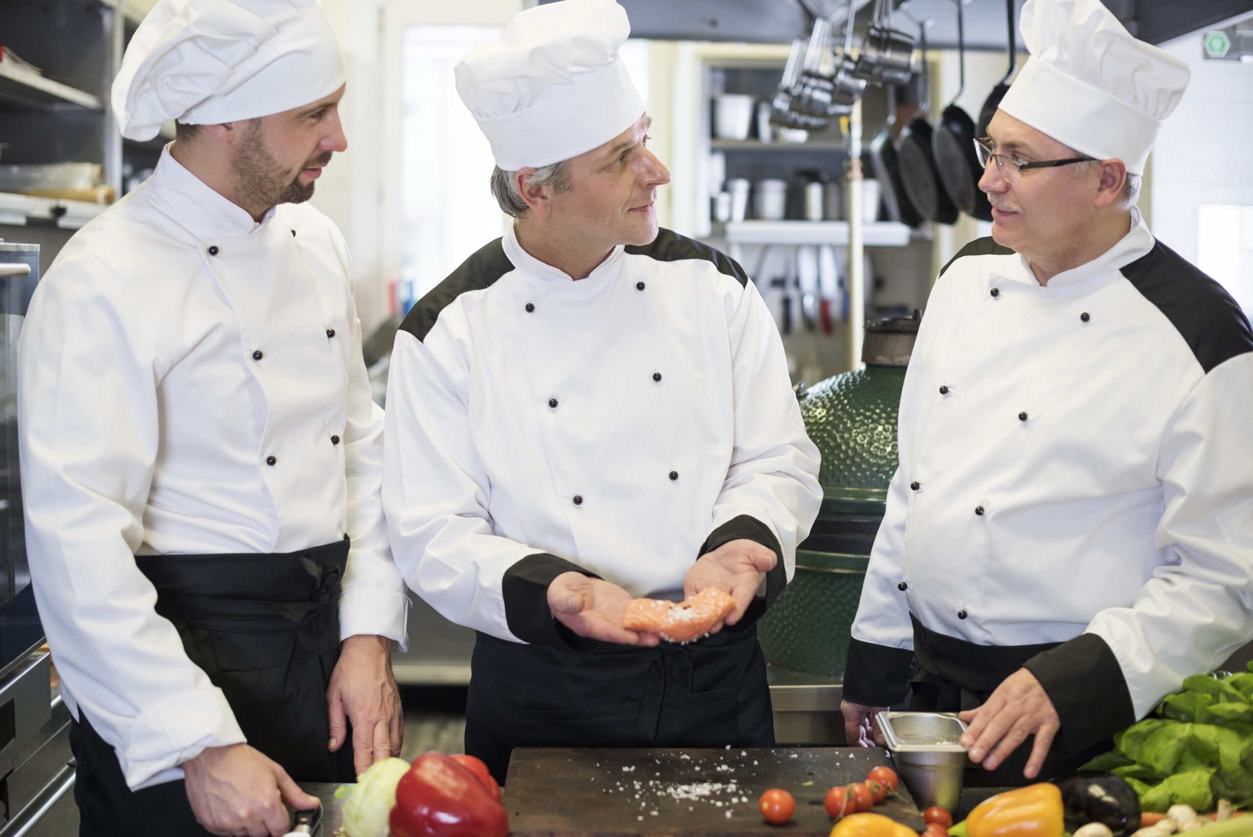 Image of chefs talking